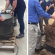 The bombsights being pulled out of the time capsules (Commemorative Air Force)